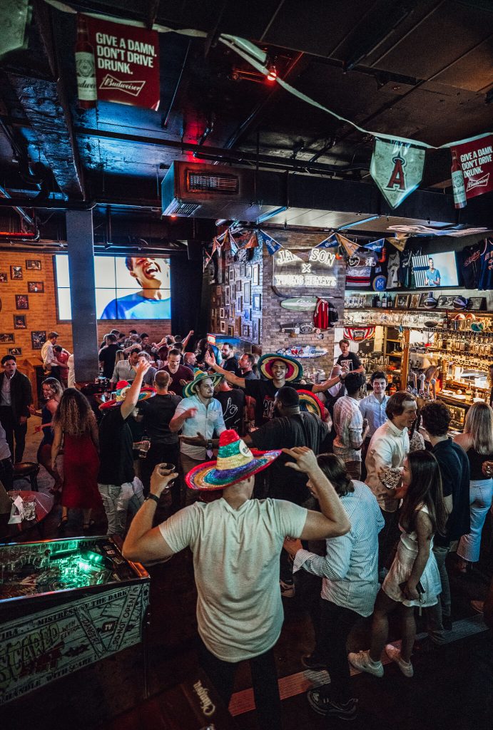 Friday night party crowd filling the bar