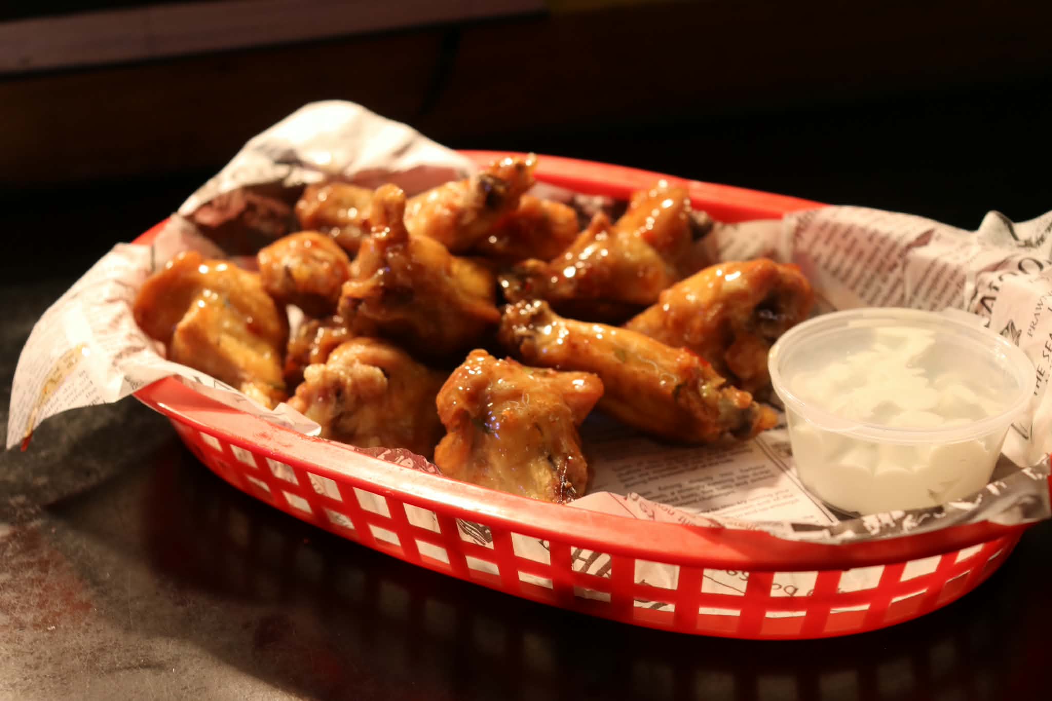 Basket of saucy buffalo wings